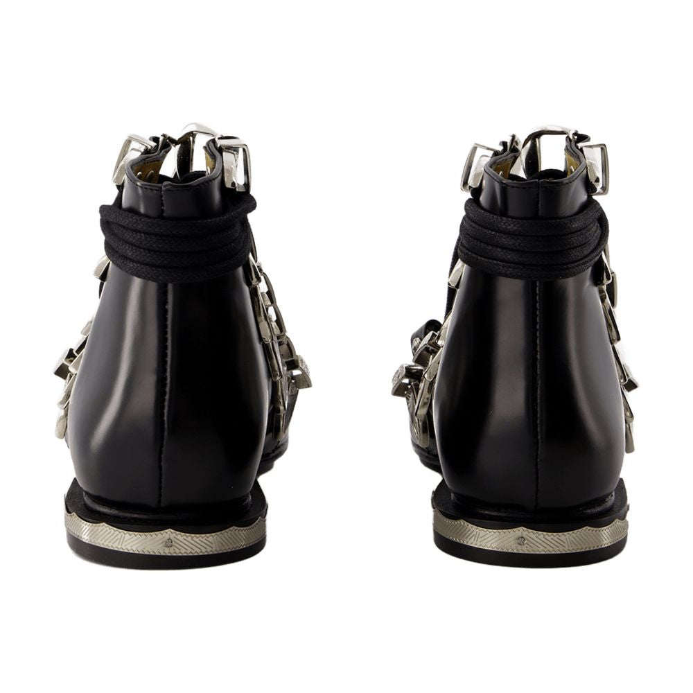 Toga Pulla Buckled Leather Ankle Boot — Black