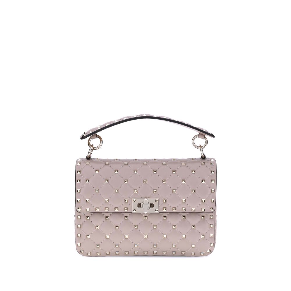 Valentino Garavani Rockstud Spike Top Handle Bag — Pink