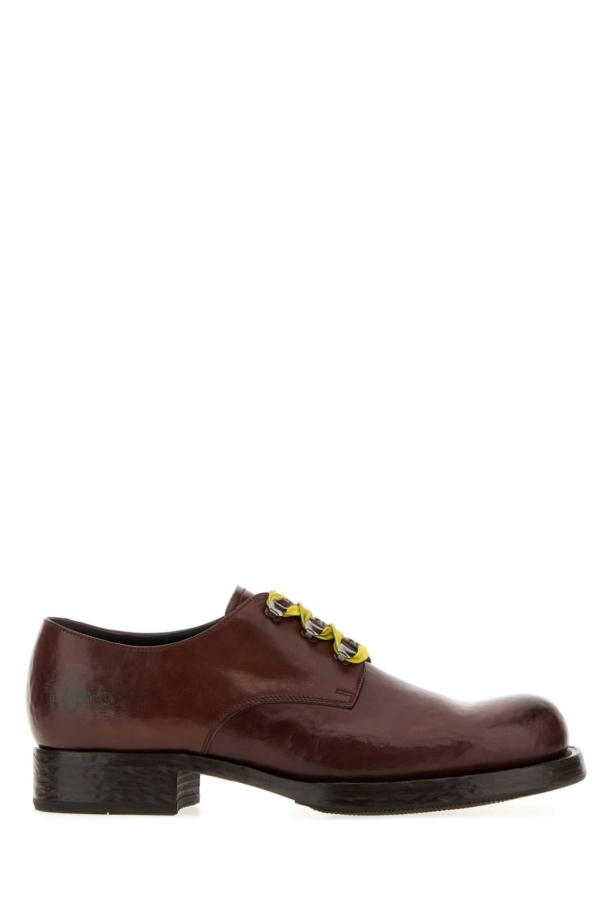 Prada Gold-Hardware Calfskin Oxford — Brown
