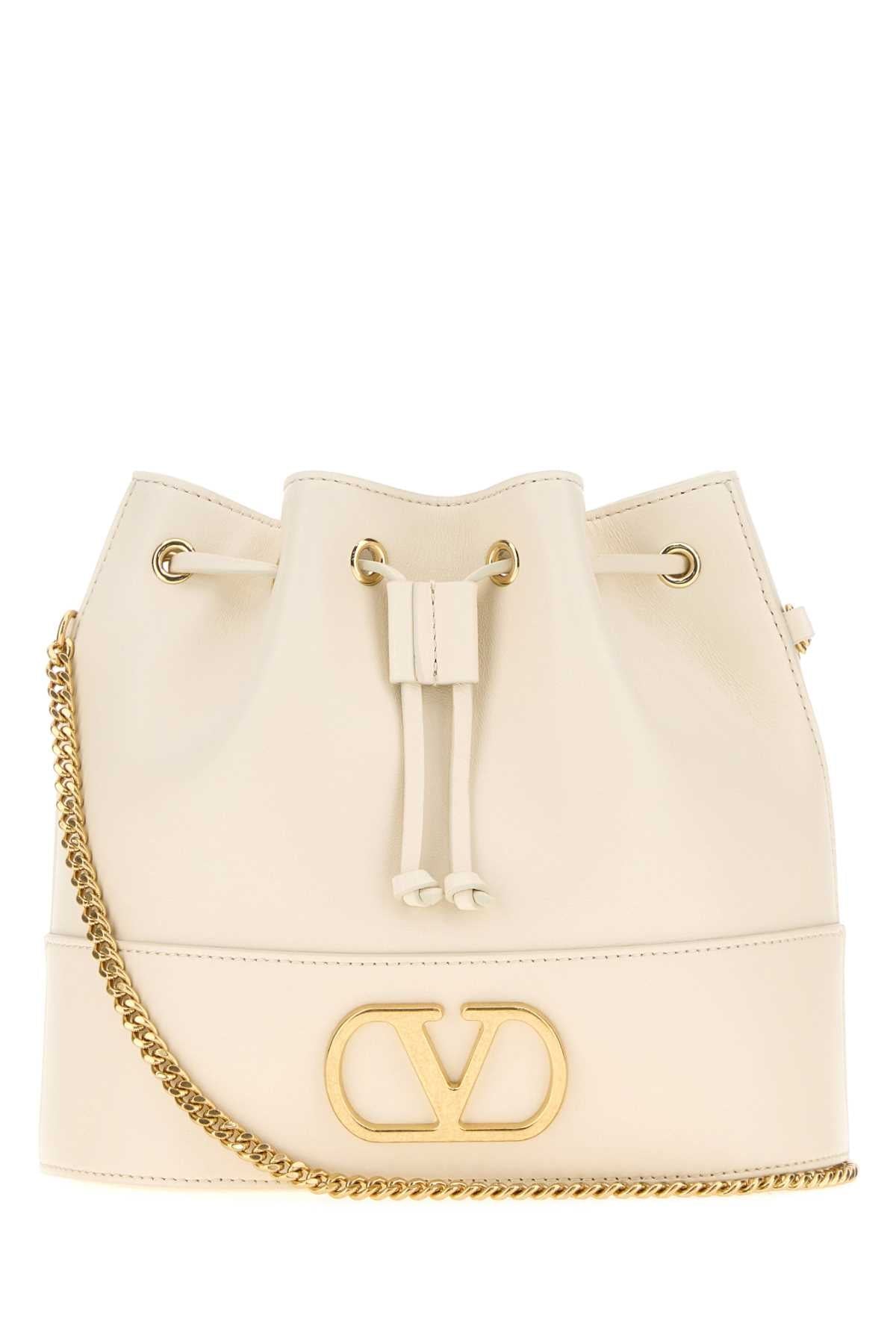 Valentino Garavani Drawstring Bucket Bag — Beige