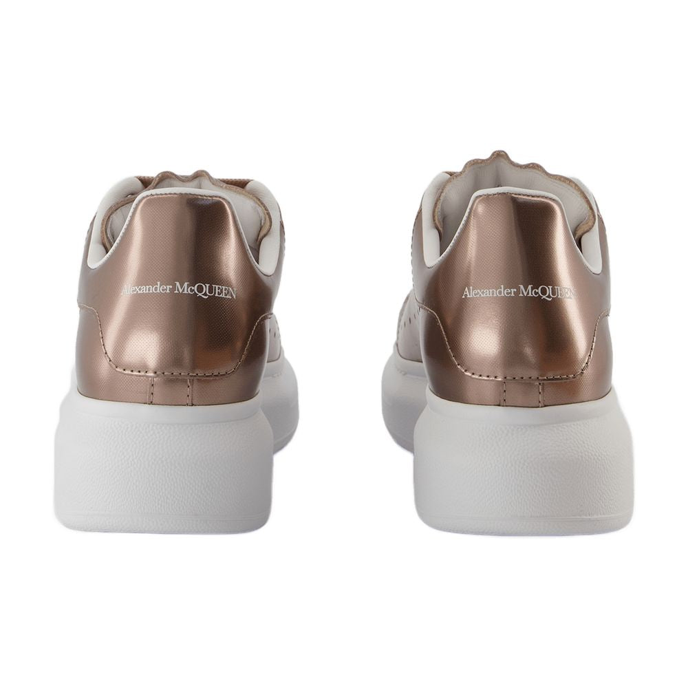 Alexander McQueen Metallic Leather Oversized Sneaker — Rose gold