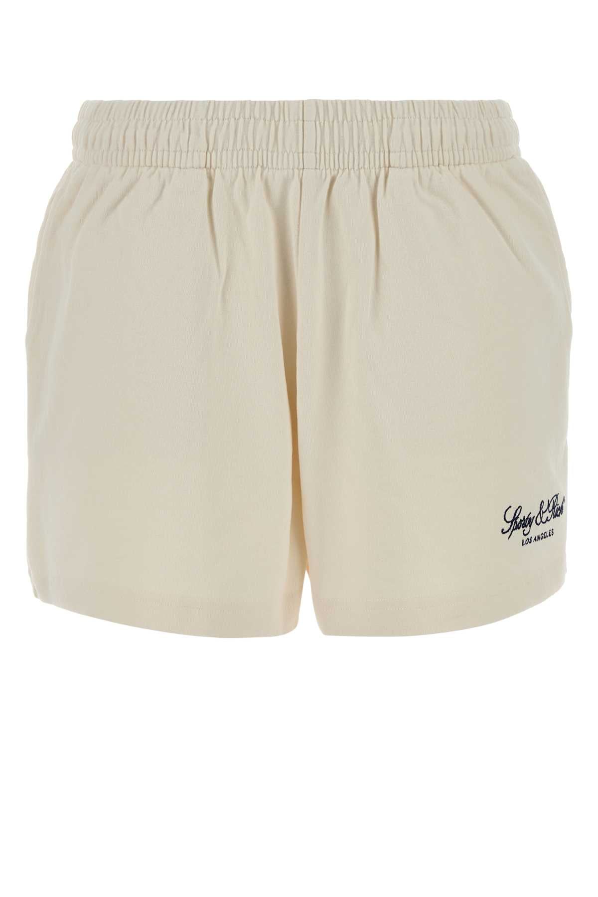 Sporty & Rich Embroidered Bermudas — Beige