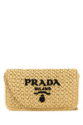 Bolso cruzado de rafia Prada — Beige