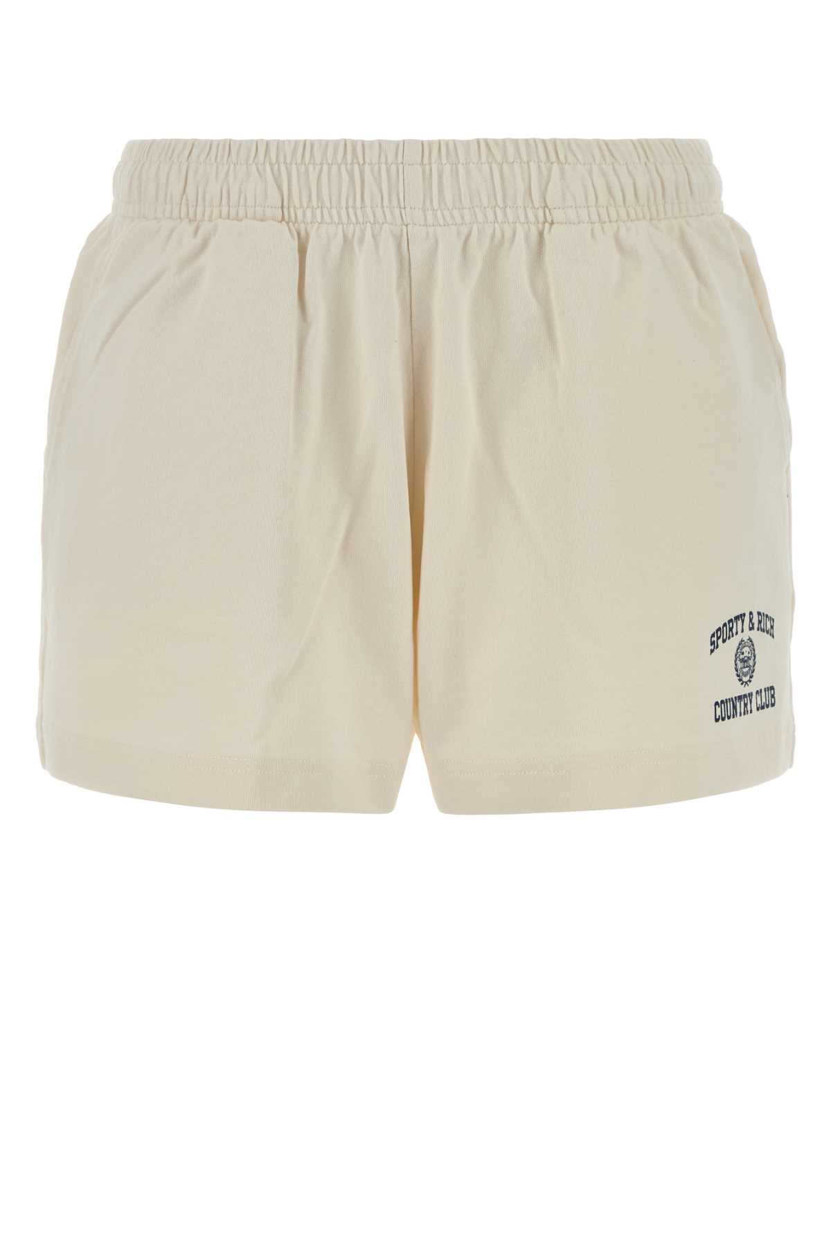 Sporty & Rich Varsity Crest Shorts — Beige
