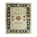 Ivory Elegance Hand Knotted Area Rug