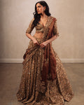 Gold Heavily Embroidered Lehenga Set With Rust Dupatta By KYNAH, Luxury Indian Fashion & Bridal Wear