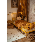 Alfombra Infantil NÜMI AMBRE con lunares 100x150