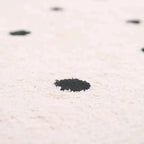 Alfombra Infantil NÜMI BLACK con lunares 100x150