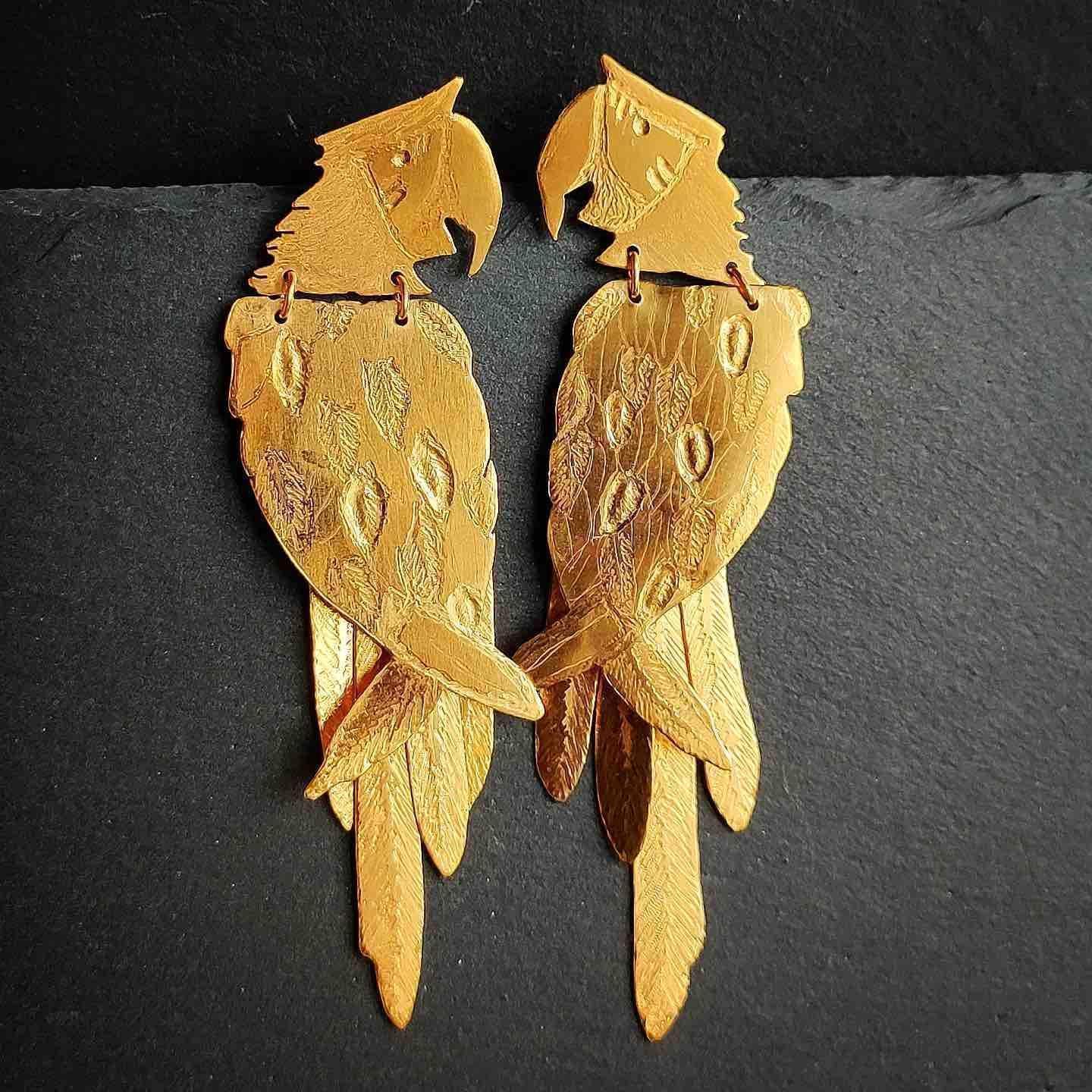 Pendientes Loro