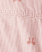 Peto de pana con lazo estampado rosa