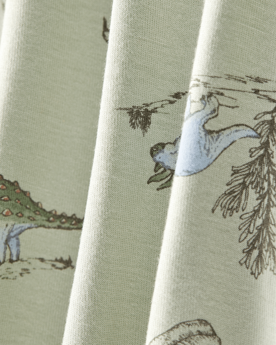 Pijama sostenible de algodón suave, diseño dinosaurios verde