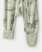Pijama sostenible de algodón suave, diseño dinosaurios verde