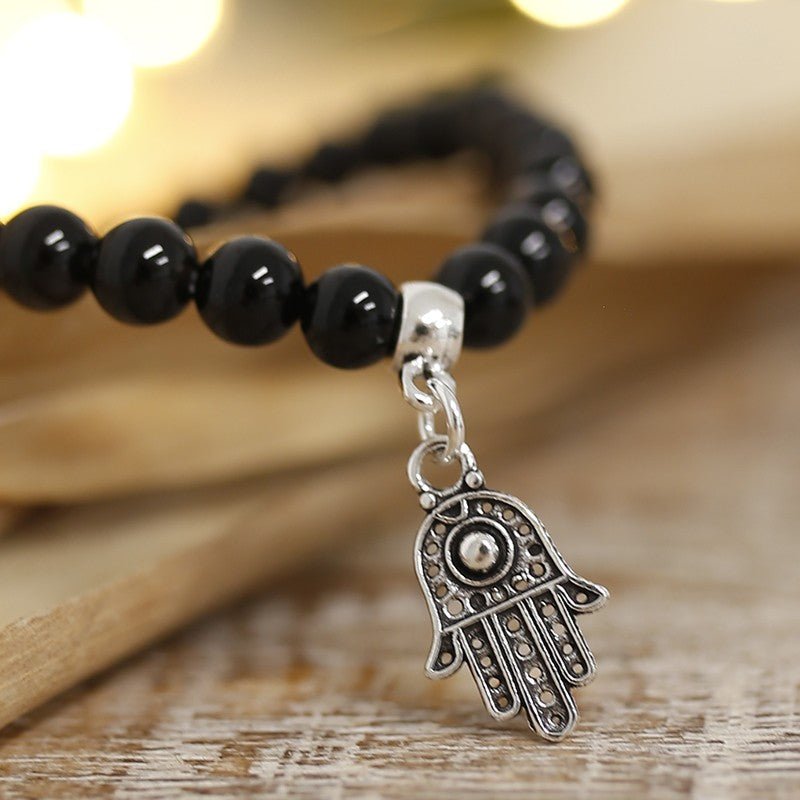 Pulsera de Ágata Negra y Mano de Fátima en Plata de Ley