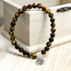 Pulsera de Ojo de Tigre y Símbolo OM