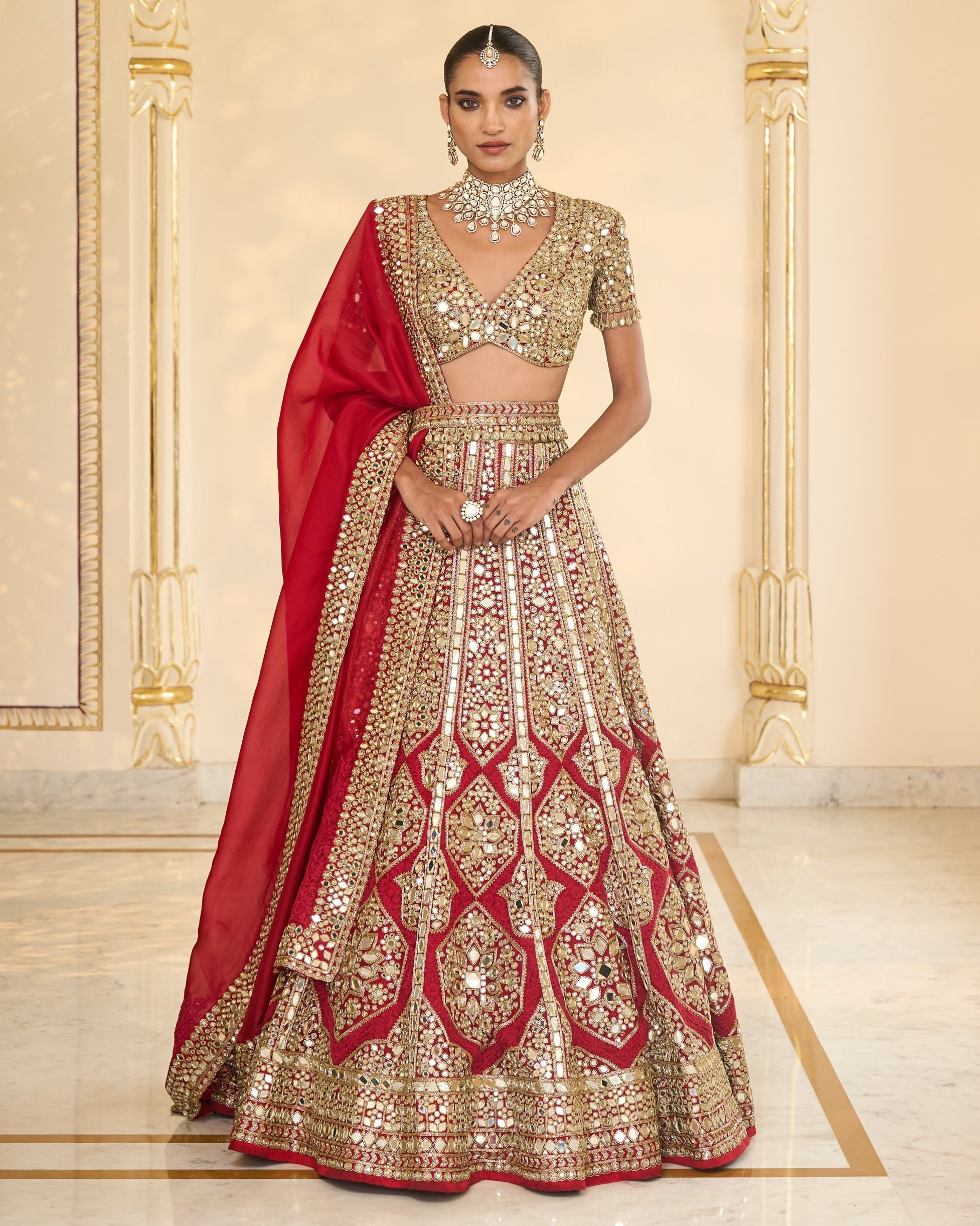Red & Gold Hand Embroidered Mirror & Thread Lehenga Set By KYNAH, Luxury Indian Fashion & Bridal Wear