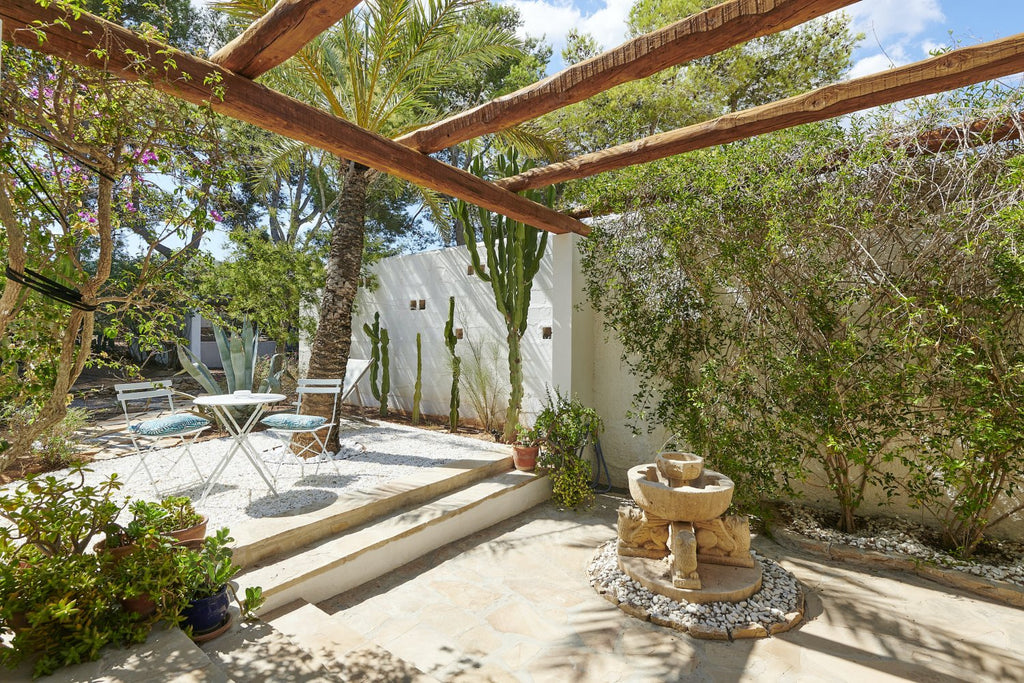 Charming Hidden Paradise Ibiza Villa with a Beautiful Lush Garden and Cozy Kitchen in San Antonio
