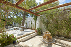 Charming Hidden Paradise Ibiza Villa with a Beautiful Lush Garden and Cozy Kitchen in San Antonio