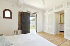 Charming Hidden Paradise Ibiza Villa with a Beautiful Lush Garden and Cozy Kitchen in San Antonio