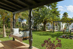 Charming Hidden Paradise Ibiza Villa with a Beautiful Lush Garden and Cozy Kitchen in San Antonio