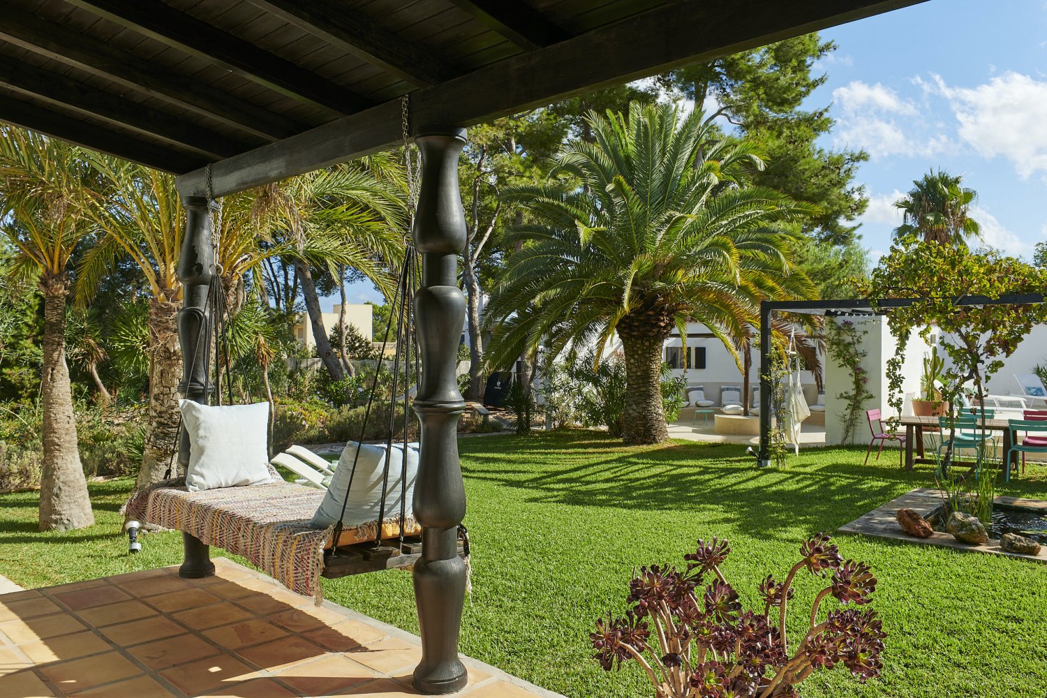 Charming Hidden Paradise Ibiza Villa with a Beautiful Lush Garden and Cozy Kitchen in San Antonio