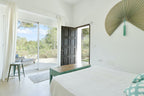 Charming Hidden Paradise Ibiza Villa with a Beautiful Lush Garden and Cozy Kitchen in San Antonio