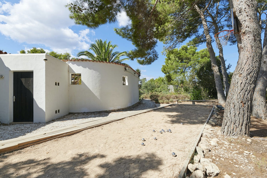 Charming Hidden Paradise Ibiza Villa with a Beautiful Lush Garden and Cozy Kitchen in San Antonio