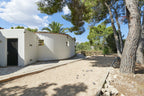 Charming Hidden Paradise Ibiza Villa with a Beautiful Lush Garden and Cozy Kitchen in San Antonio