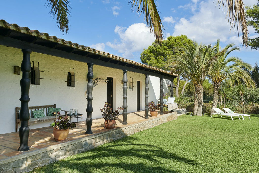 Charming Hidden Paradise Ibiza Villa with a Beautiful Lush Garden and Cozy Kitchen in San Antonio