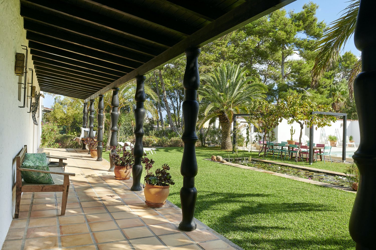 Charming Hidden Paradise Ibiza Villa with a Beautiful Lush Garden and Cozy Kitchen in San Antonio