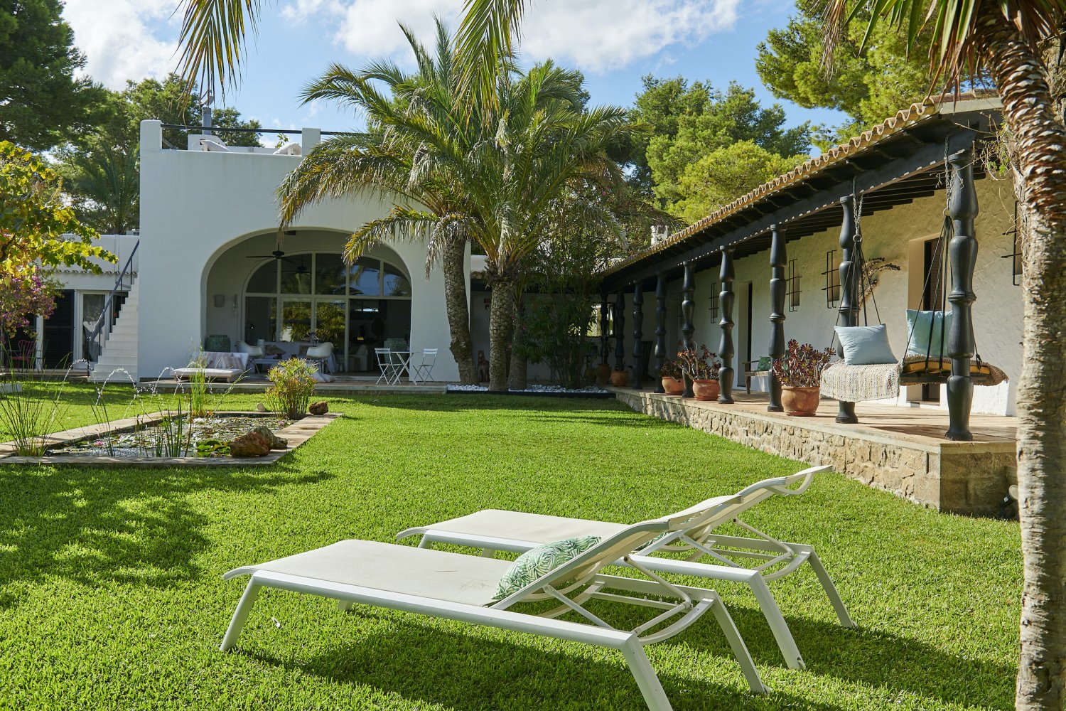 Charming Hidden Paradise Ibiza Villa with a Beautiful Lush Garden and Cozy Kitchen in San Antonio
