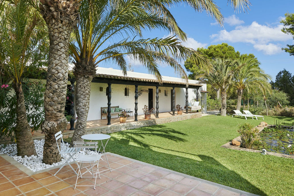 Charming Hidden Paradise Ibiza Villa with a Beautiful Lush Garden and Cozy Kitchen in San Antonio