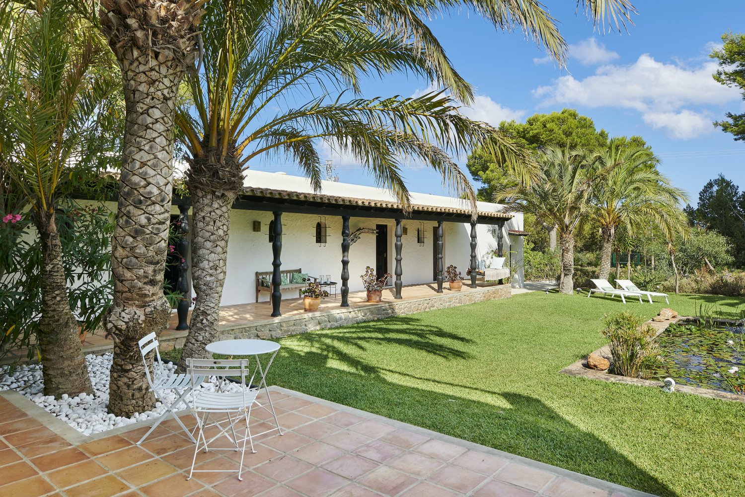 Charming Hidden Paradise Ibiza Villa with a Beautiful Lush Garden and Cozy Kitchen in San Antonio
