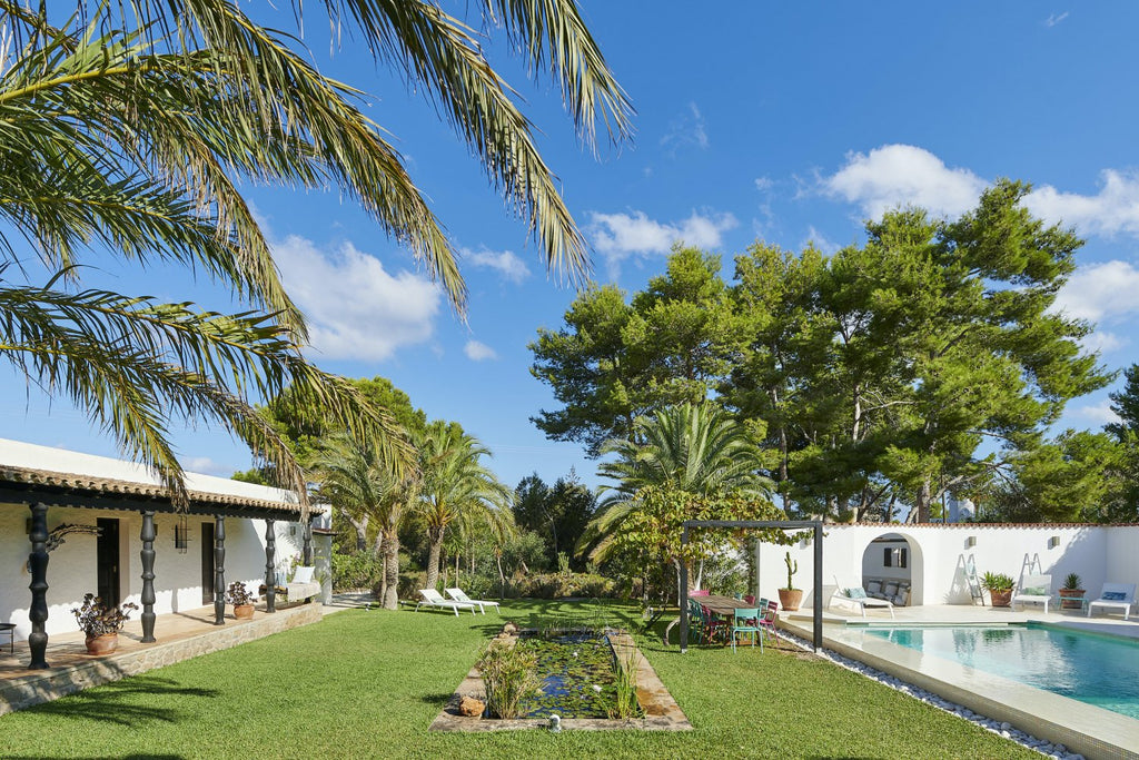 Charming Hidden Paradise Ibiza Villa with a Beautiful Lush Garden and Cozy Kitchen in San Antonio