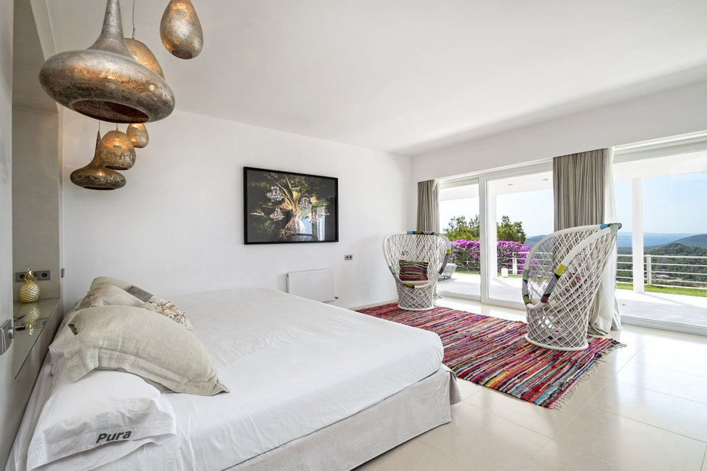 Modern Luxury Ibiza Villa with Huge Kitchen, Stunning Views and Spacious En-Suite Bedrooms near Es Cubells