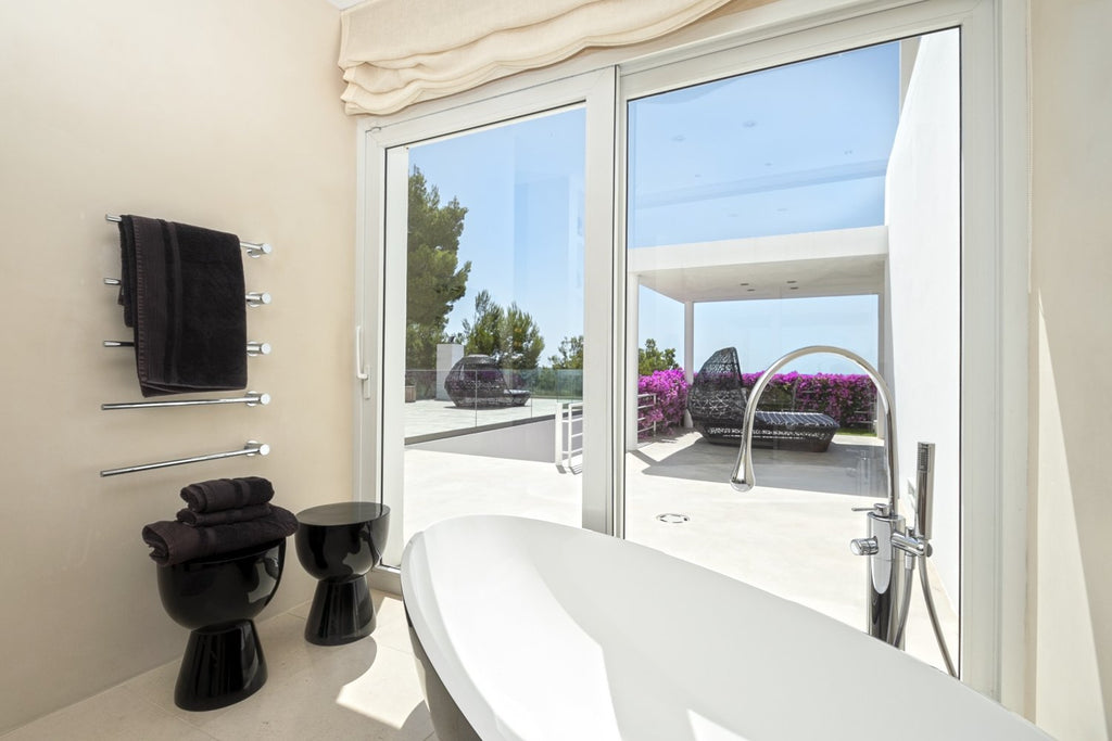 Modern Luxury Ibiza Villa with Huge Kitchen, Stunning Views and Spacious En-Suite Bedrooms near Es Cubells