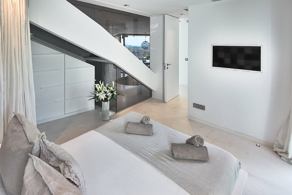 Clifftop Modern Ibiza Villa Designed to Enjoy the Island’s Good Life near Es Torrent