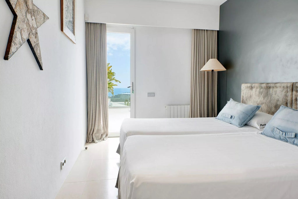 Modern Luxury Ibiza Villa with Huge Kitchen, Stunning Views and Spacious En-Suite Bedrooms near Es Cubells