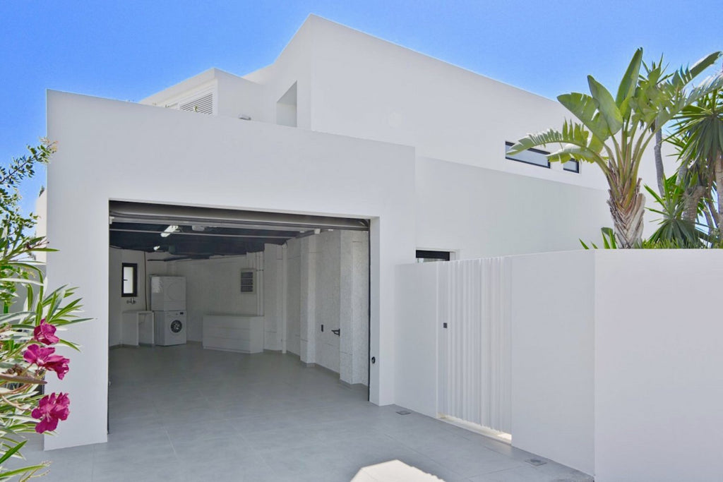 Clifftop Modern Ibiza Villa Designed to Enjoy the Island’s Good Life near Es Torrent