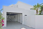 Clifftop Modern Ibiza Villa Designed to Enjoy the Island’s Good Life near Es Torrent