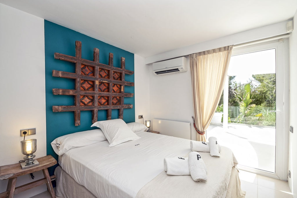 Modern Luxury Ibiza Villa with Huge Kitchen, Stunning Views and Spacious En-Suite Bedrooms near Es Cubells