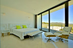 Modern Style Ibiza Villa with Five Spacious En-Suite Bedrooms, Luxurious Interiors, Impressive Kitchen and Panoramic Views of Es Torrent near Es Cubells