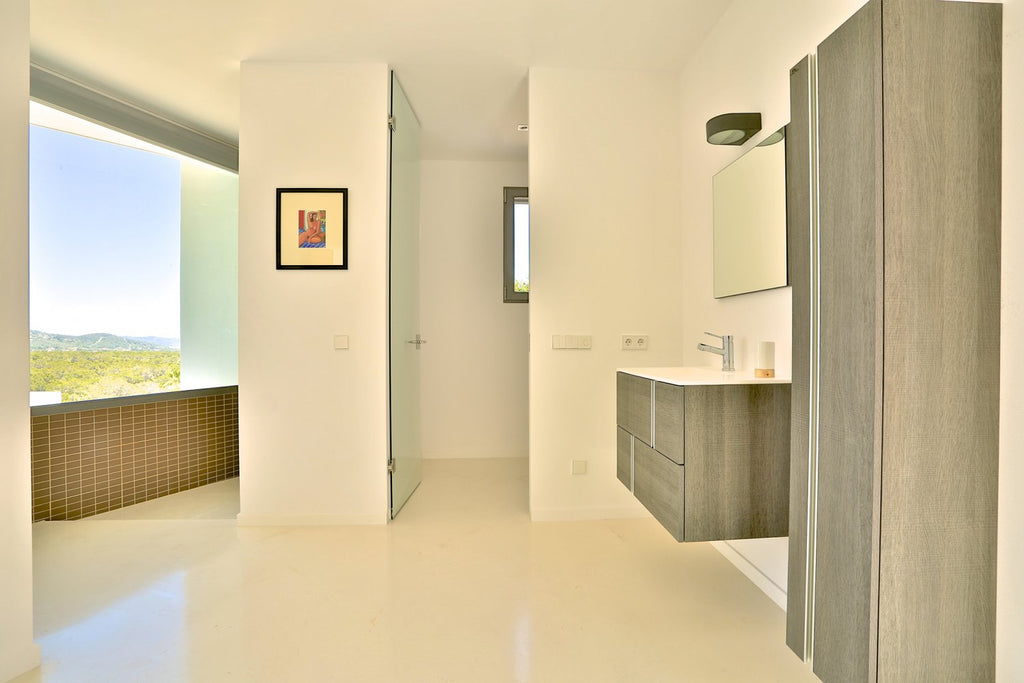 Modern Style Ibiza Villa with Five Spacious En-Suite Bedrooms, Luxurious Interiors, Impressive Kitchen and Panoramic Views of Es Torrent near Es Cubells
