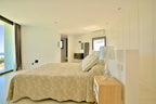 Modern Style Ibiza Villa with Five Spacious En-Suite Bedrooms, Luxurious Interiors, Impressive Kitchen and Panoramic Views of Es Torrent near Es Cubells